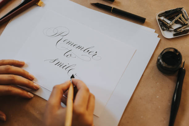 istock Close-up image of calligrapher working. 1284986159