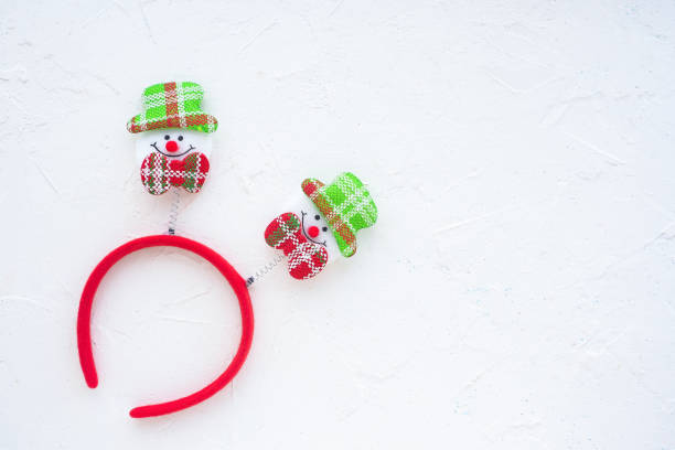 christmas carnival headband with snowman muzzles on white background
