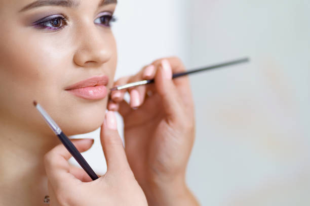 istock Make up artist work in her beauty visage studio salon 1284987410