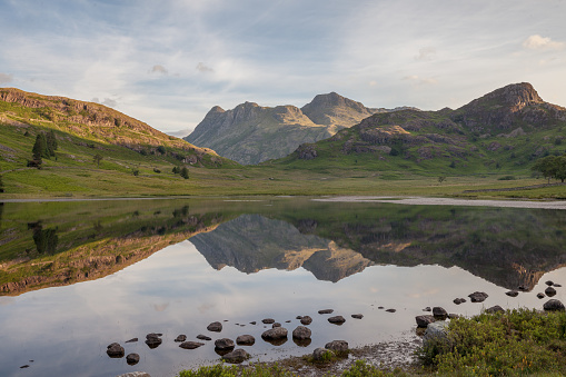 View of the Langdale Pikes in the English Lake District. Taken from Blea Tarn. Early Morning in summer 2020.