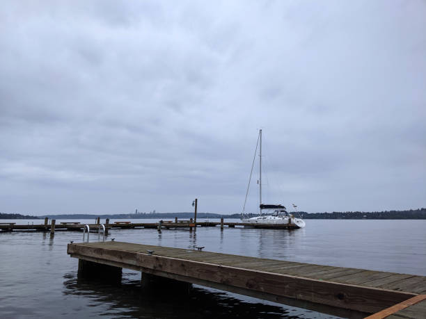 boat docked on Lake Washington on an overcast day