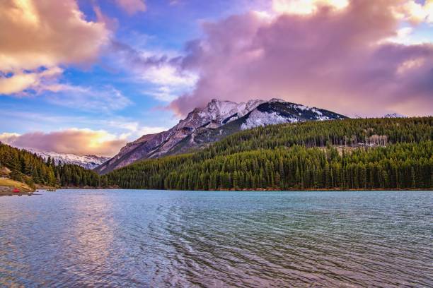 istock Vibrant Sunrise Sky Over Two Jack Lake 1284996394