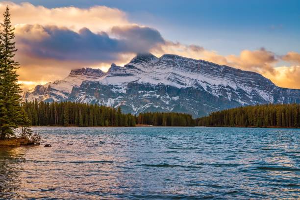 istock Vibrant Sunrise Sky Over Two Jack Lake 1284996626