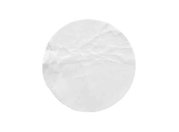 istock Blank white round paper sticker label isolated on white background with clipping path 1284998978