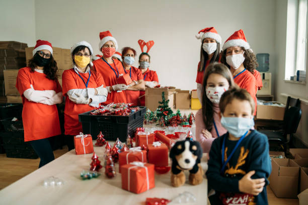 istock Volunteers working in a charity center 1284999396