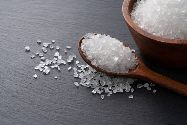 istock Himalayan rock salt placed on a black background with space 1284999470
