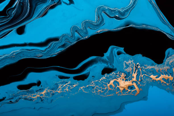 istock Acrylic Fluid Art. Blue waves and gold inclusion. Abstract stone background or texture 1284999866