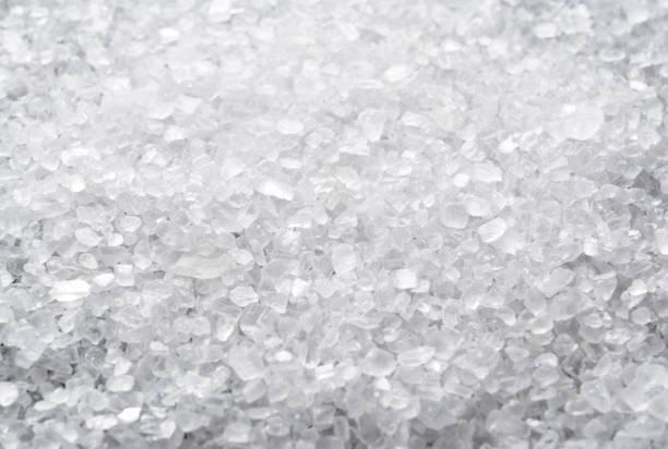 istock Himalayan rock salt spread over the entire screen. Texture. Close-Up 1284999948