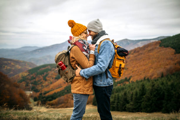 istock Young loving couple hugging at autumn walk 1285000622