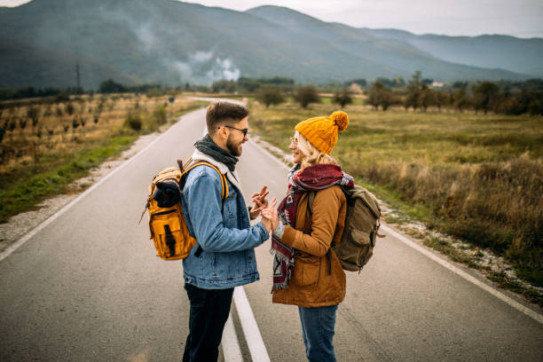 istock Couple having fun time on countryside walk 1285000651