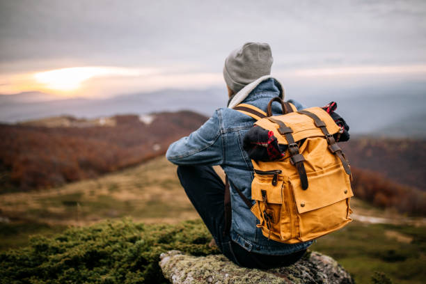 istock Deserved rest after hiking up to the mountain peak 1285001524
