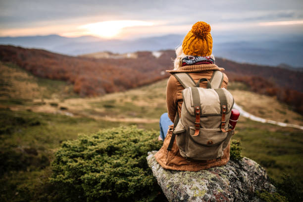 istock Enjoying beautiful mountain sunset 1285001557