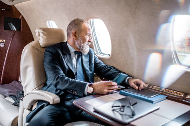 istock First class business traveler enjoys the flight after work 1285002295