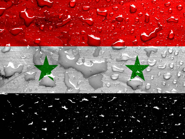 istock flag of Syria with rain drops 1285003329