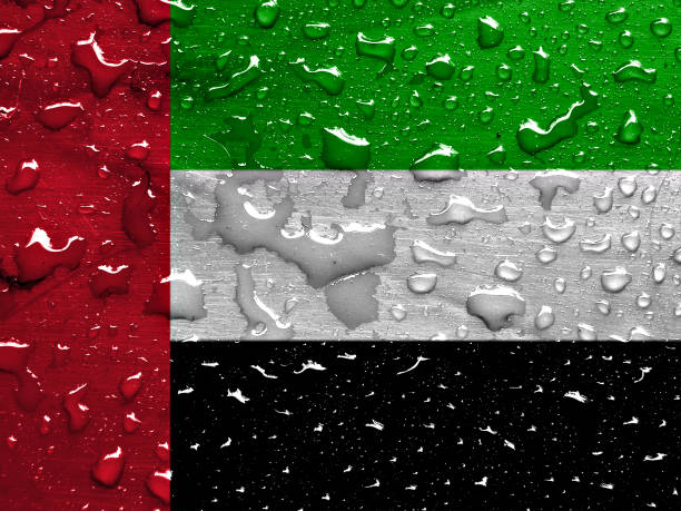istock flag of UAE with rain drops 1285003391