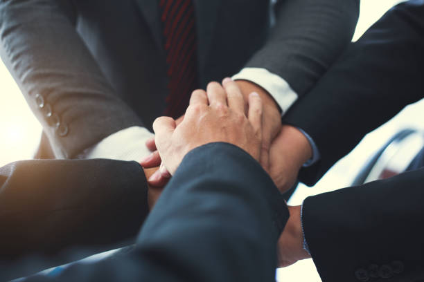 istock Power of cooperation in the construction business.To succeed in developing sustainable partnerships. 1285012317