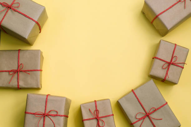 istock Handcrafted gifts on yellow bakground, Natural deisgn. 1285013277