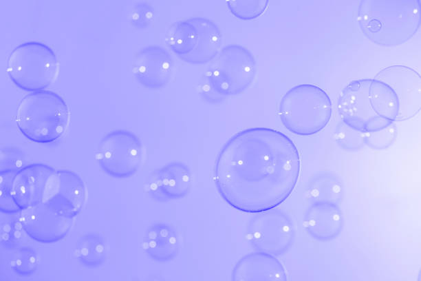 istock Beautiful shiny purple soap bubbles texture background. Abstract, Natural fresh soapy summer background. 1285015831