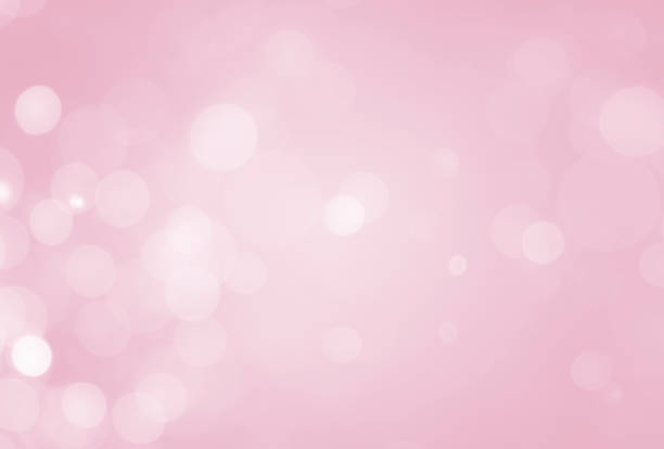 istock White lights bokeh, Defocus glitter blur on soft pink texture background. Bokeh valentine's, beautiful sweet shiny. 1285015856