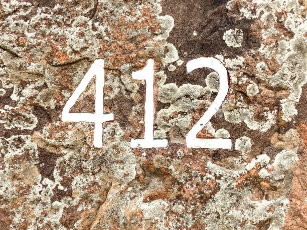 istock House Address Number 412 on Mossy Rock 1285016101