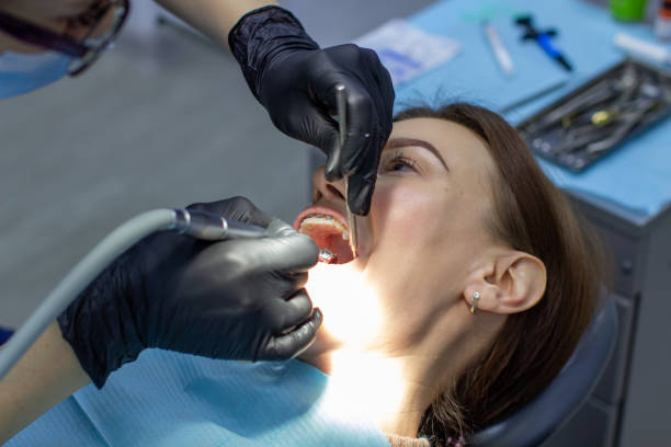 istock A woman at a dentist's appointment to replace arches with braces 1285025566