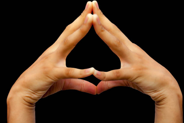istock Shot of a human doing Hakini mudra isolated black background. 1285025756