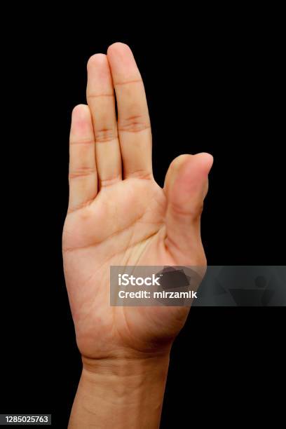 Shot Of Male Hands Isolated On Black Background Demonstrating Kalesvara Mudra Stock Photo - Download Image Now
