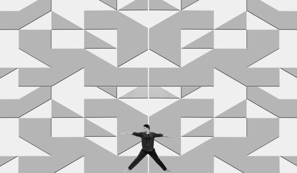 istock Full-length shot of a smiling man doing some static stretching exercises on a decorative floral design floor isolated on white. 1285025859
