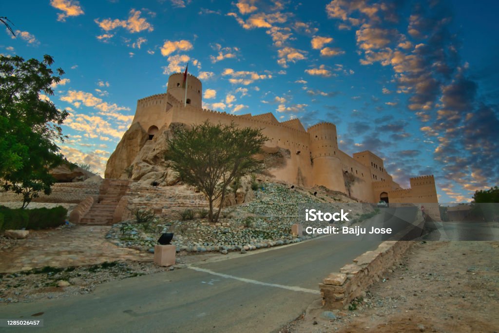 Nakhal Fort,Nakhal,Sultanate of Oman. Nakhal Fort is a large fortification in Al Batinah Region of Oman.Built on the foundations of a pre-Islamic structure, the towers and entrance of this fort were constructed during the reign of Imam Said Bin Sultan in 1834. Oman Stock Photo