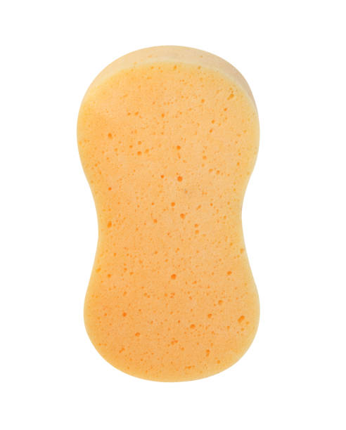 istock Yellow sponge isolated on the white background 1285028601