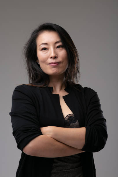 istock Confident professional Asian woman deep in thought 1285029596