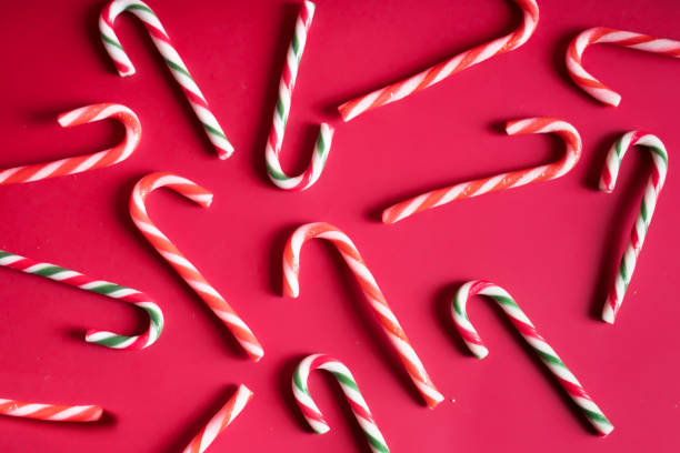 istock Christmas lollipops on red background 1285031831