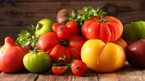 istock variety of tomatoes and herbs 1285034993