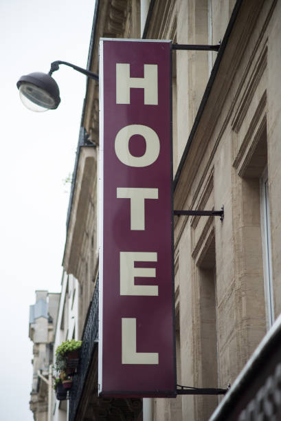 istock Hotel sign on building facade 1285037060