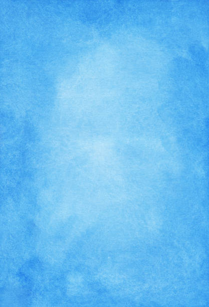 istock Watercolor light blue background painting texture. Stains on paper. 1285037272