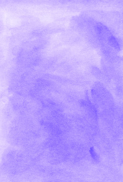 istock Watercolor light lavender background texture. Pastel purple aquarelle backdrop. Stains on paper 1285037285