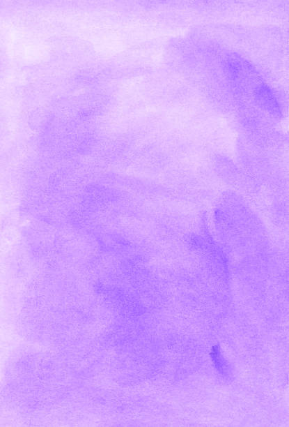 istock Watercolor light lavender background texture. Pastel purple aquarelle backdrop. Stains on paper 1285037295
