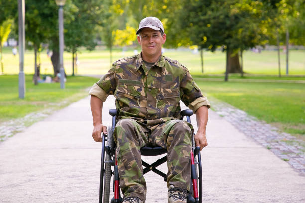 istock Happy disabled military man in wheelchair 1285038131