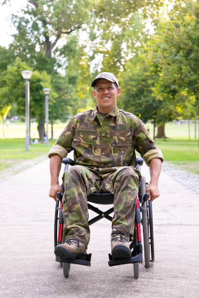 istock Cheerful disabled military man in wheelchair 1285038162