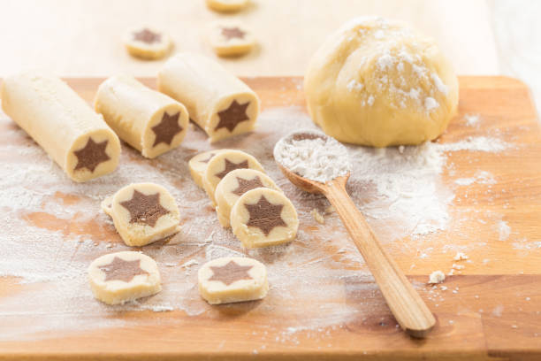 istock Baking Christmas cookies with chocolate star. 1285041172