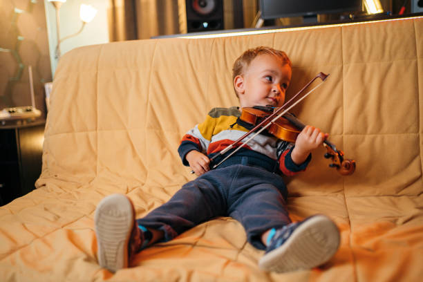 istock Cute little musician 1285043622