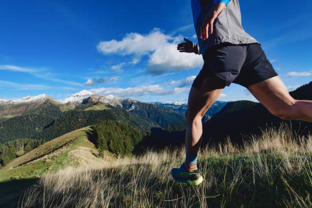 istock Detail of mountain runner legs during a downhill workout 1285043717