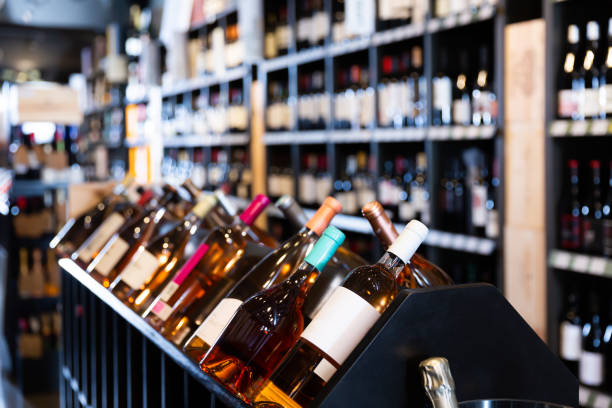istock Rack with various wine bottles in wine store 1285046519