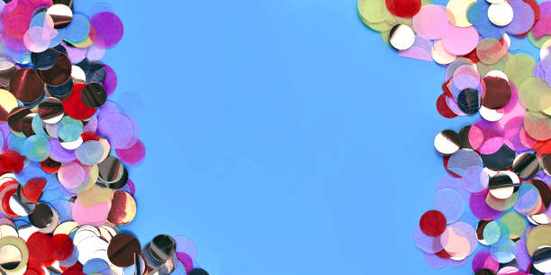istock Banner with colorful round paper confetti on blue background 1285049202