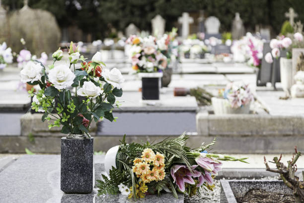 istock Flowers in the cemetery 1285053854
