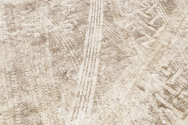 istock Wheel tracks in the mud 1285055034