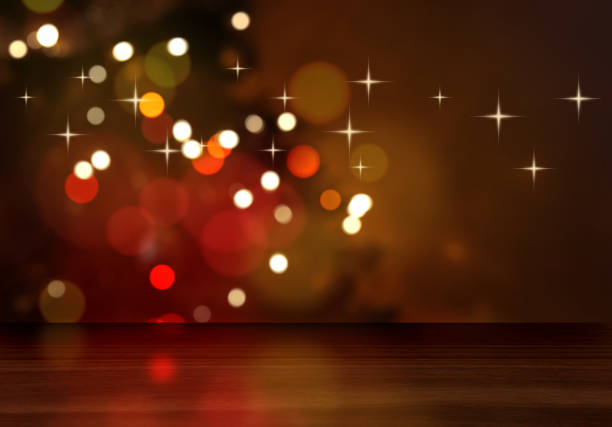 istock 3D wooden table looking out to a defocussed Christmas tree 1285055216