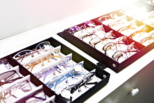 Glasses on shoecase in store