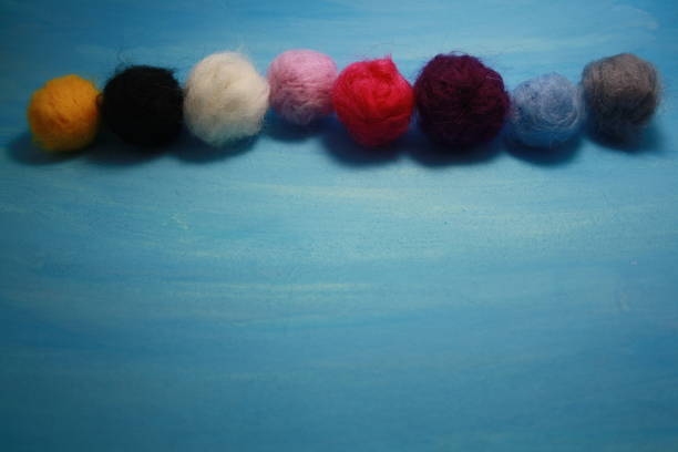 istock Balls of colored wool for making beads. 1285059838