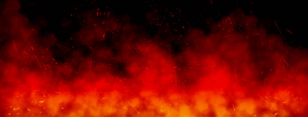 istock Orange fire or flames with sparkles and smoke in black background. 1285064460